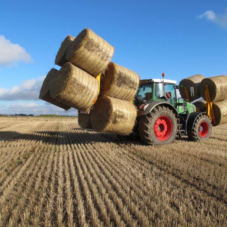 Octa-Quad Bale Handling System - front and rear sections for carrying 12 round bales at a time.